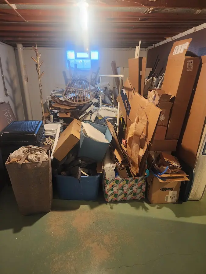 Roll-off dumpster container at job site for 2 Yard Dumpster Rental in Cherryville